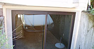 Swapped out garage door for new Pella sliding patio door.